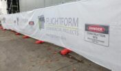 Rolls of branded fence wrap